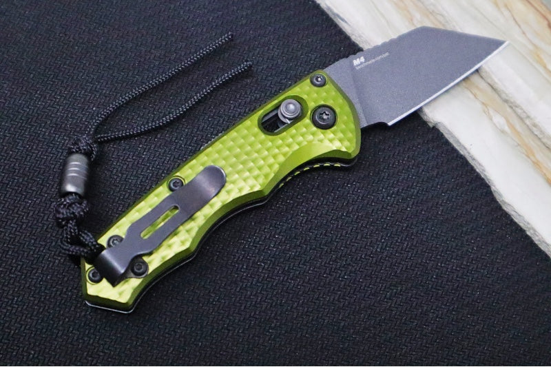 Benchmade 2950BK-2 Partial Immunity Auto - Cobalt Black Cerakote Finish  / CPM-M4 Steel / Wharncliffe Blade / Woodland Green Anodized Aluminum Handle