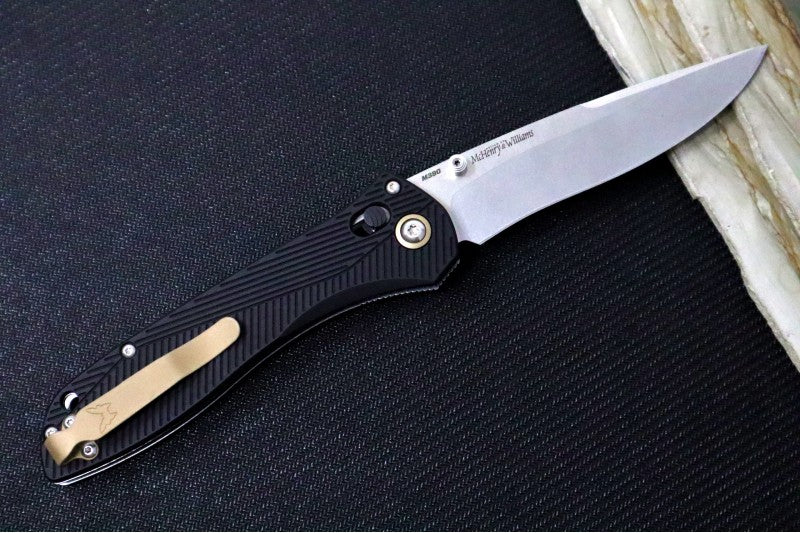 Benchmade 710-25 SEVEN | TEN  - Recurve Drop Point Blade / M390 Steel / Black Machined Aluminum Handle / FDE PVD Accents