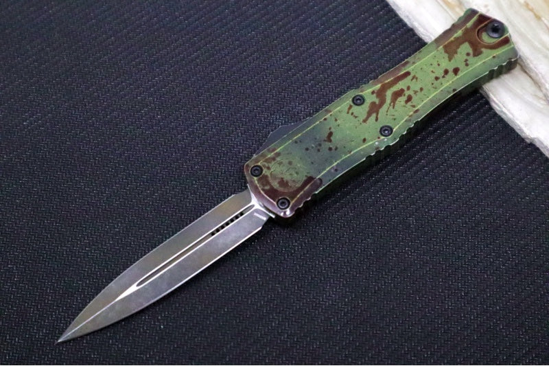 Microtech Mini Hera II Outbreak OTF - Dagger Blade / Dark Apolcoplyptic Finish / Outbreak Green Anodized Aluminum Handle with Blood Splatter / Deep Engraved Biohazard Symbol 1702M-1OBDS