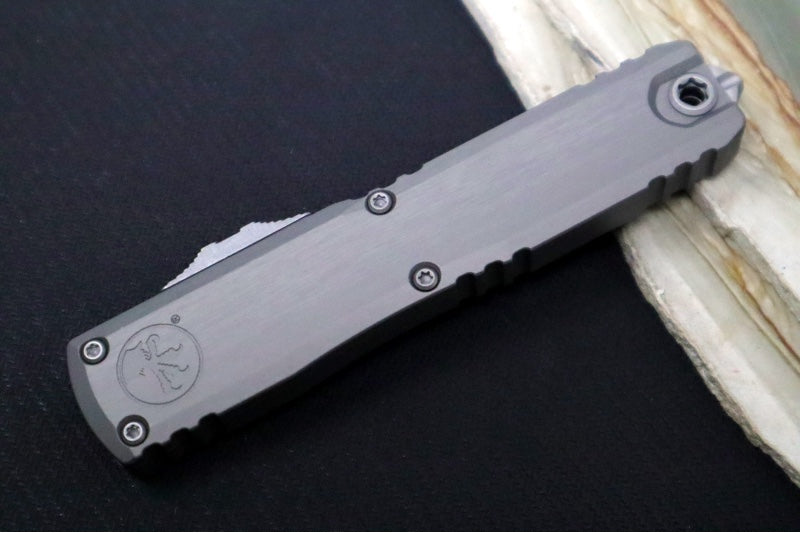 Microtech Ultratech ZBP (Zero Blade Play) OTF - Apocalyptic Finish / Single Edge / Natural Clear Anodized Aluminum Handle 1121-10APNC