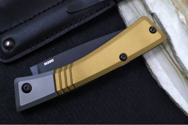 Benchmade 315BK-01 Successor - M390 Steel / Spearpoint Blade/ Black DLC Finish / Burnt Brass Anodized Aluminum & Ash Gray Aluminum Bolsters