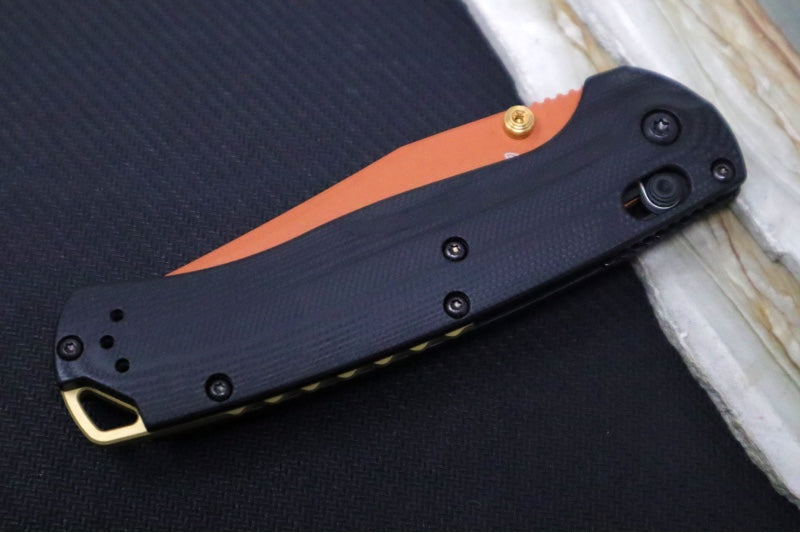 Benchmade 15536CR-2501 Taggedout Manual Folder Limited Edition - CPM-S45VN Steel / Clip Point Blade / Black G-10 Handle & Gold Backspacer