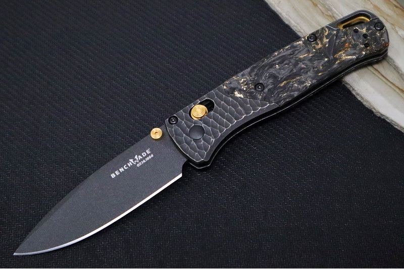 Benchmade 535 Bugout Gold Class - Titanium Hammered Bolster & Fatcarbon Steller Handle Onlay / M390 Steel / Drop Point Blade with Black Cerakote / Last Chance Gulch MT Blade Engraving / Gold Plated Backspacer & Thumb Stud