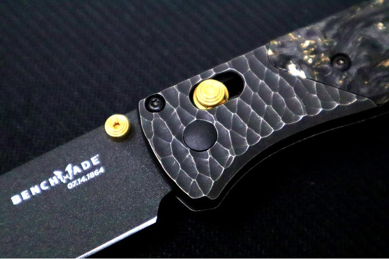 Benchmade 535 Bugout Gold Class - Titanium Hammered Bolster & Fatcarbon Steller Handle Onlay / M390 Steel / Drop Point Blade with Black Cerakote / Last Chance Gulch MT Blade Engraving / Gold Plated Backspacer & Thumb Stud