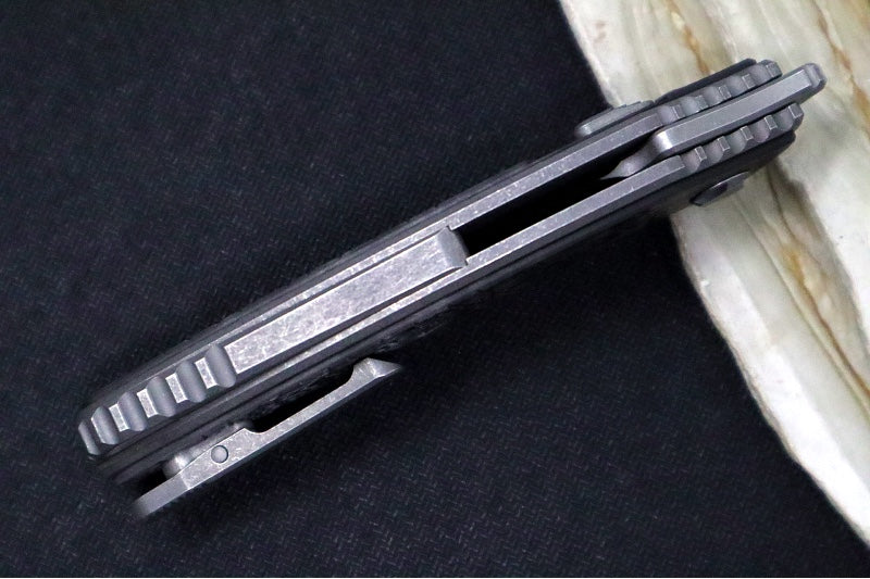 Hawk Knife Designs Talon Button Lock Flipper - Black Dunes Carbon Fiber Inlay & Tumbled Titanium Handle / M390 Steel / Tumbled Finish / Sheepsfoot Blade