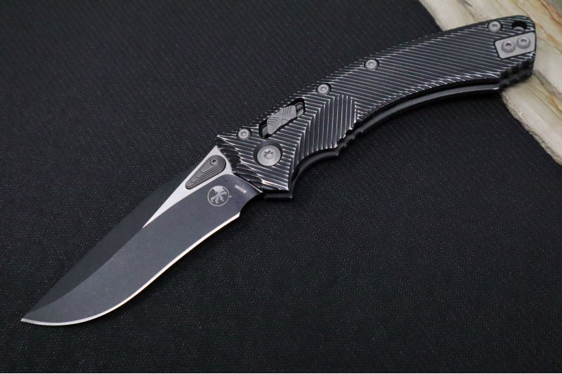 Microtech Amphibian Folder RAM-Lok - Drop Point / Distressed Fluted Black Aluminum Handle 137RL-1FLDBK