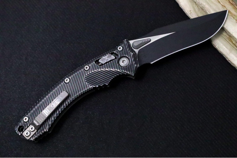 Microtech Amphibian Folder RAM-Lok - Drop Point / Distressed Fluted Black Aluminum Handle 137RL-1FLDBK