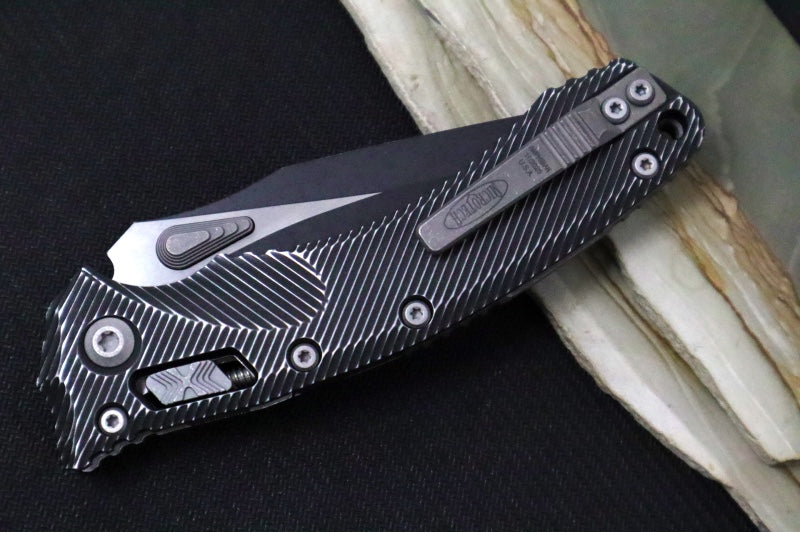 Microtech Amphibian Folder RAM-Lok - Drop Point / Distressed Fluted Black Aluminum Handle 137RL-1FLDBK