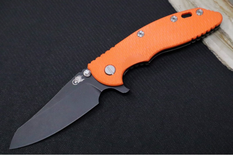 Rick Hinderer Knives XM-18 - Tri Way Pivot- 3.5" Sheepsfoot Blade / Battle Black Finish / Orange G-10 Handle / Battle Black Finished Frame / CPM-S45VN Steel