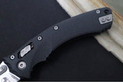 Microtech Amphibian Folder RAM-Lok - Drop Point with Partial Serrate / Fluted Black G-10 Handle 137RL-11FLGTBK - Northwest Knives