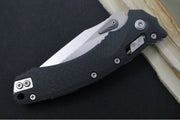 Microtech Amphibian Folder RAM-Lok - Drop Point with Partial Serrate / Fluted Black G-10 Handle 137RL-11FLGTBK - Northwest Knives