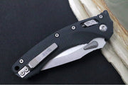 Microtech Amphibian Folder RAM-Lok - Drop Point with Partial Serrate / Fluted Black G-10 Handle 137RL-11FLGTBK - Northwest Knives