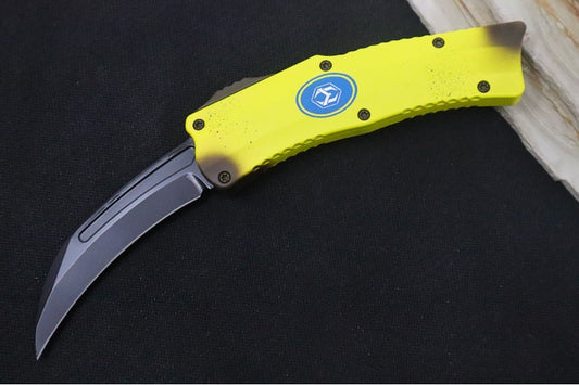 Heretic Knives Stabana OTF - Yellow & Brown Anodized Aluminum Handle / Black DLC Finished Blade / Single Edge Hawkbill Style