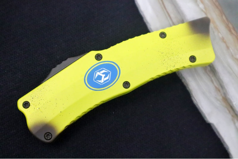 Heretic Knives Stabana OTF - Yellow & Brown Anodized Aluminum Handle / Black DLC Finished Blade / Single Edge Hawkbill Style - Northwest Knives
