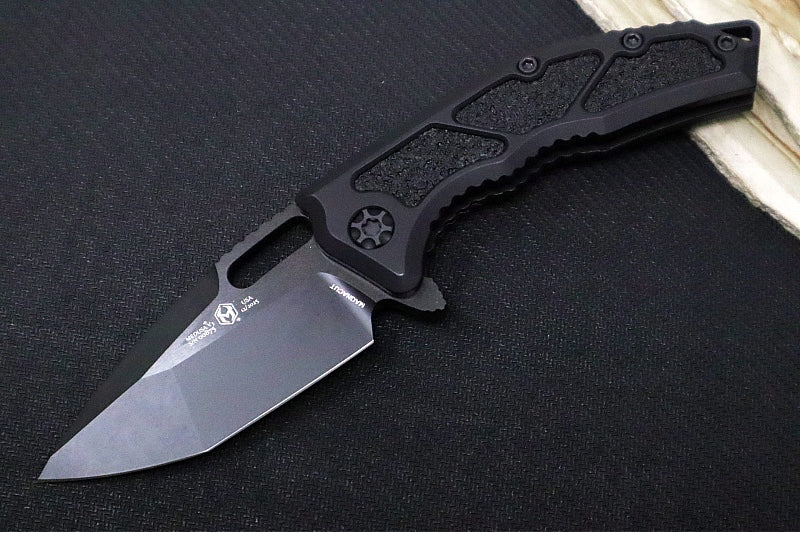 Heretic Knives Medusa Manual Flipper - Tanto Blade / CPM-Magnacut Steel / Black Anodized Aluminum Handle with Black Grip-Tape Inlays / Black Tactical DLC Finished Blade and Hardware H009-6A-T
