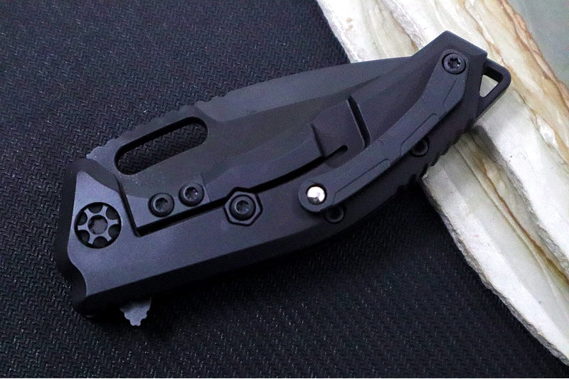 Heretic Knives Medusa Manual Flipper - Tanto Blade / CPM-Magnacut Steel / Black Anodized Aluminum Handle with Black Grip-Tape Inlays / Black Tactical DLC Finished Blade and Hardware H009-6A-T