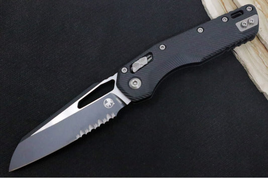 Microtech MSI Manual Folder - Black Two-Toned Finished Blade with Partial Serrate / Fluted Black G-10 Handle 210-2FLGTBK