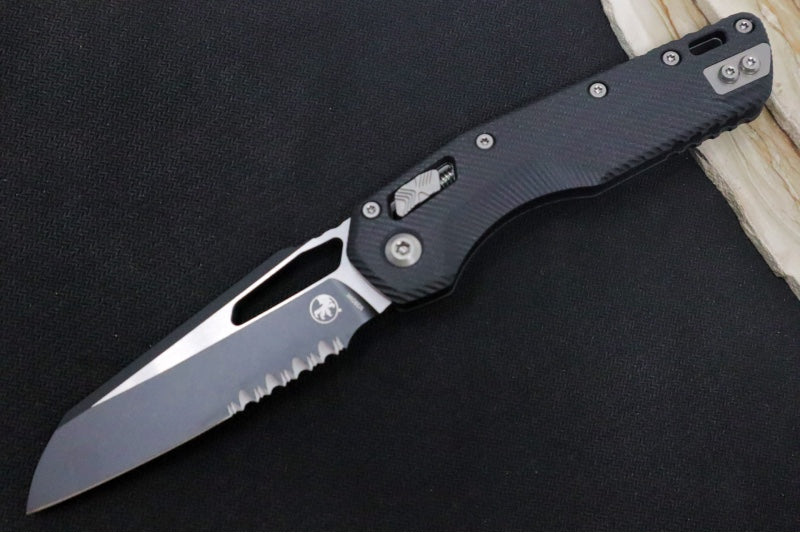 Microtech MSI Manual Folder - Black Two-Toned Finished Blade with Partial Serrate / Fluted Black G-10 Handle 210-2FLGTBK - Northwest Knives