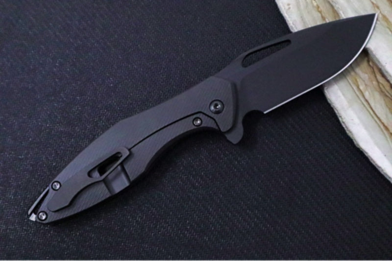 Koenig Mini Arius Flipper - Matte Black DLC Corda Patterned Handle - Matte Black DLC Finished Blade - Black DLC Spacer & Hardware & Clip (Gen 1) - Northwest Knives