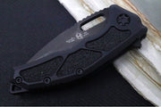Heretic Knives Medusa Manual Flipper - Recurve Blade / CPM-Magnacut Steel / Black Anodized Aluminum Handle with Black Grip-Tape Inlays / Black Tactical DLC Finished Blade and Hardware H010-6A-T - Northwest Knives