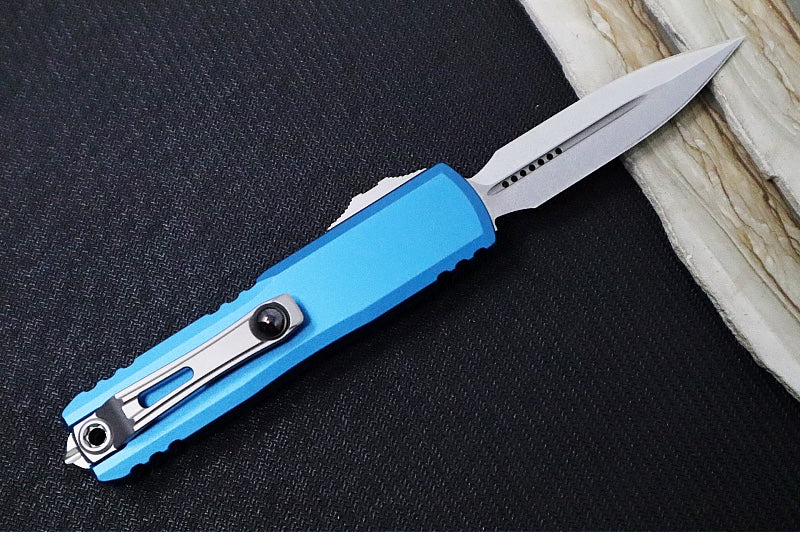 Microtech UTX-85 OTF Gen IV- Dagger Blade / Stonewashed Finish / Blue Anodized Aluminum Handle 12324-10BL