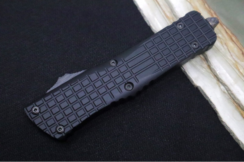 Microtech Signature Series Combat Troodon OTF - Black DLC Blade / Full Serrated Double Edge Dagger / Black Frag Aluminum Handle / Nickel Boron Internals - 142-3CT-DHS