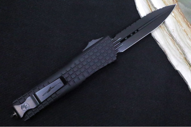 Microtech Signature Series Combat Troodon OTF - Black DLC Blade / Full Serrated Double Edge Dagger / Black Frag Aluminum Handle / Nickel Boron Internals - 142-3CT-DHS