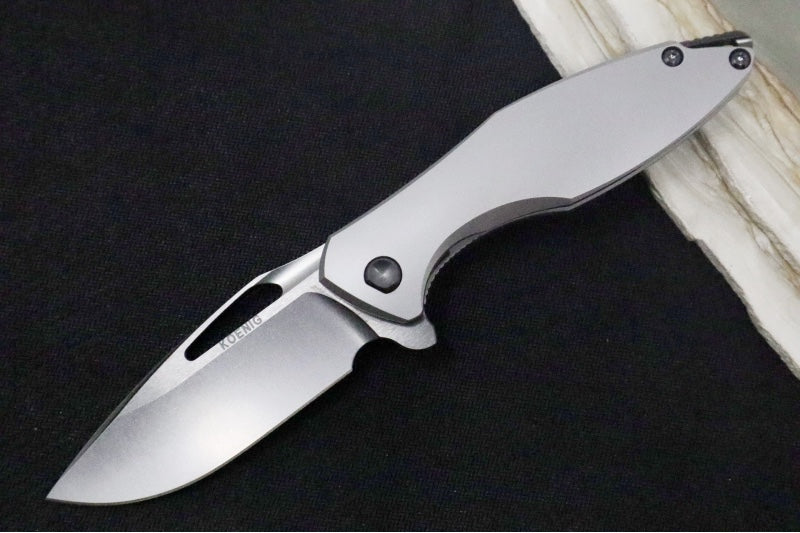 Koenig Arius - Standard with Smooth Titanium Handle / Brightwashed DLC M390 Blade & Polished Flats / DLC Hardware & Clip & Spacer Hardware (Gen 4)