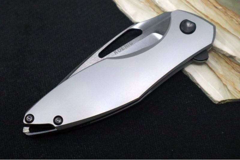 Koenig Arius - Standard with Smooth Titanium Handle / Brightwashed DLC M390 Blade & Polished Flats / DLC Hardware & Clip & Spacer Hardware (Gen 4)