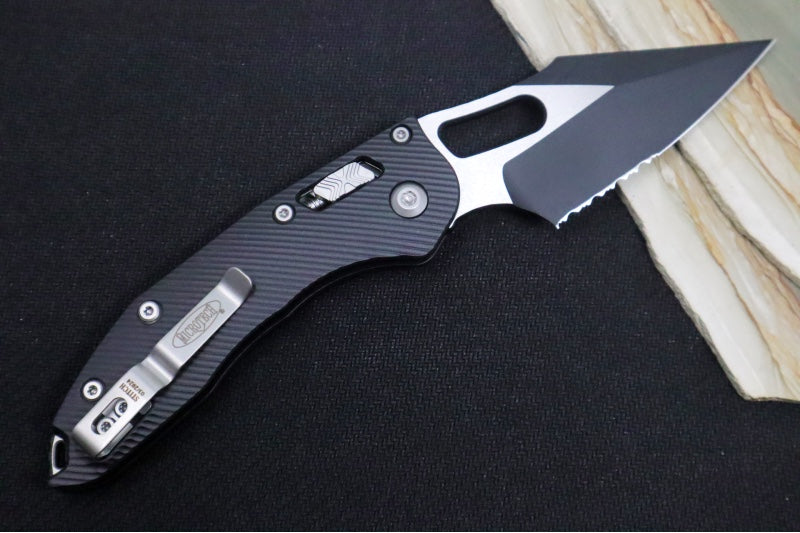 Microtech Stitch RAM-Lock Manual - Spear Point Blade with Partial Serrates / Black Two-Toned Finish / Black Fluted Anodized Aluminum Handle 169RL-2FL