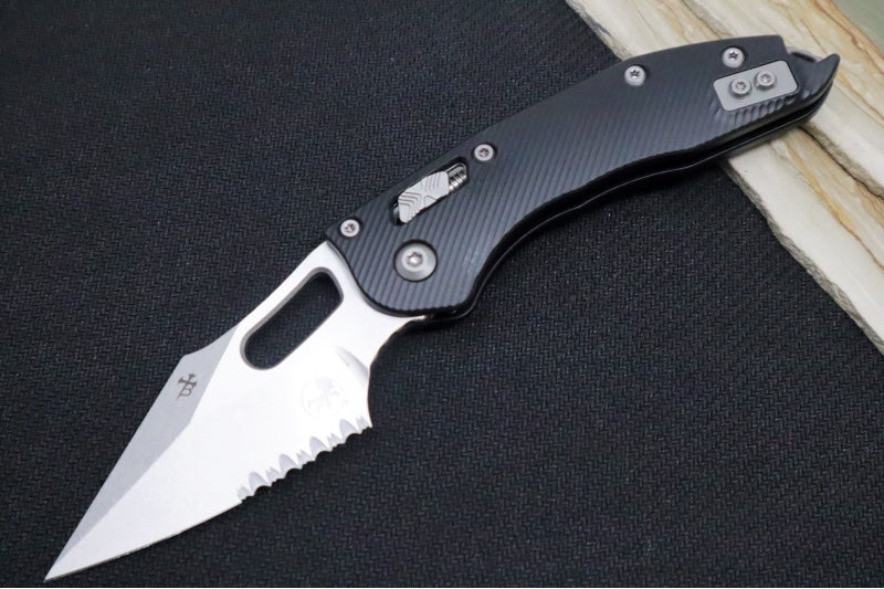 Microtech Stitch RAM-Lock Manual - Spear Point Blade with Partial Serrate / Stonewashed Finish / Black Fluted Anodized Aluminum Handle 169RL-11FL