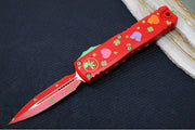 Microtech UTX-85 OTF Gen IV St. Patty's Day Edition - Dagger Blade / Red Finish / Red "St Patty's Day" Anodized Aluminum Handle 12324-1SPDS - Northwest Knives