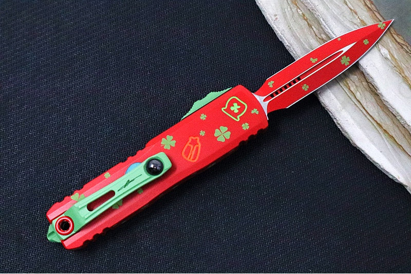 Microtech UTX-85 OTF Gen IV St. Patty's Day Edition - Dagger Blade / Red Finish / Red "St Patty's Day" Anodized Aluminum Handle 12324-1SPDS - Northwest Knives