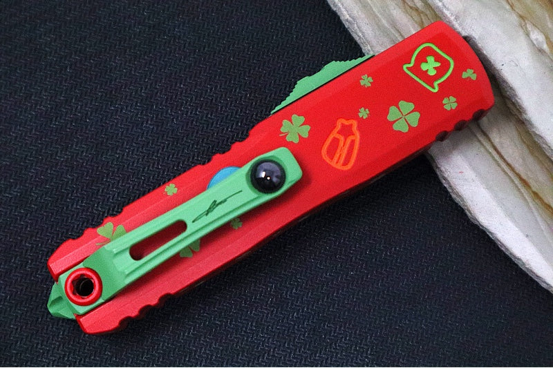 Microtech UTX-85 OTF Gen IV St. Patty's Day Edition - Dagger Blade / Red Finish / Red "St Patty's Day" Anodized Aluminum Handle 12324-1SPDS - Northwest Knives