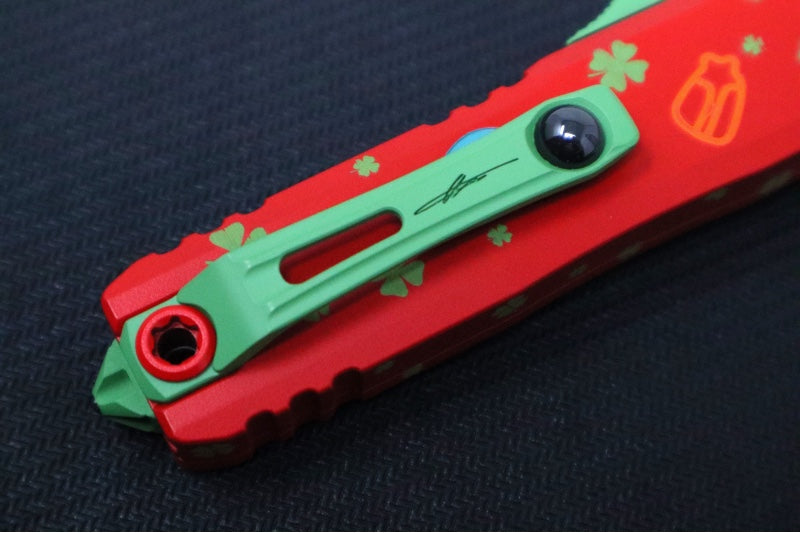 Microtech UTX-85 OTF Gen IV St. Patty's Day Edition - Dagger Blade / Red Finish / Red "St Patty's Day" Anodized Aluminum Handle 12324-1SPDS - Northwest Knives