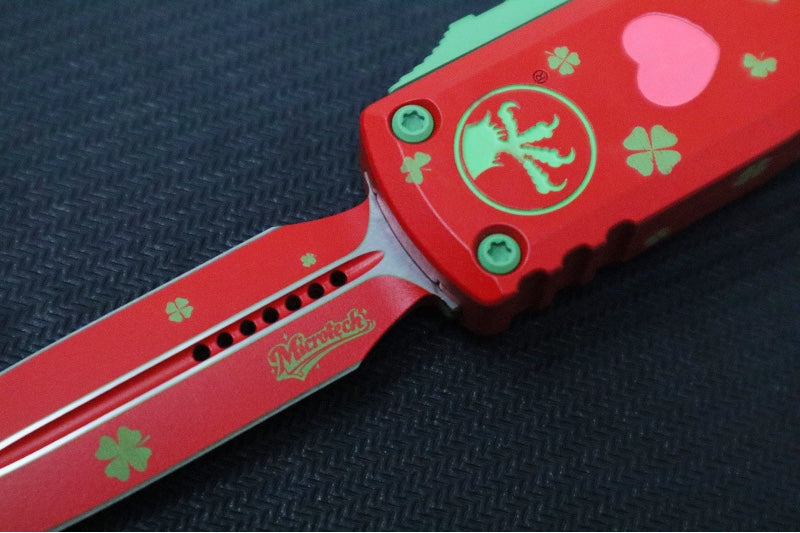 Microtech UTX-85 OTF Gen IV St. Patty's Day Edition - Dagger Blade / Red Finish / Red "St Patty's Day" Anodized Aluminum Handle 12324-1SPDS - Northwest Knives