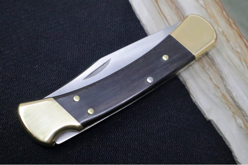 Buck 110 Folding Hunter - Clip Point Blade / Stainless Steel / Ebony Wood Handle / Genuine Leather Sheath 0110BRS-B - Northwest Knives