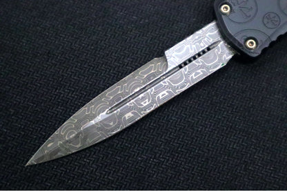 Microtech Mini Hera Signature Series OTF - Damascus Steel / Bayonet Blade / Black Aluminum Handle with Deep Engraved Claw Burst Pattern 1701M-16CBS