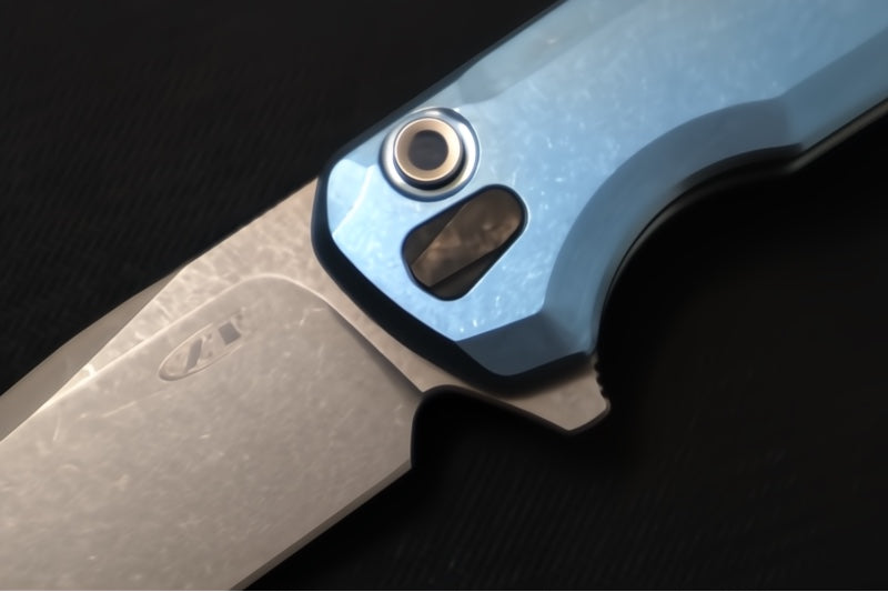 Zero Tolerance 0044BLU Button Lock Flipper Limited Edition - CPM-S90V Steel / Stonewashed Finish / Blue Anodized Full Titanium Handle