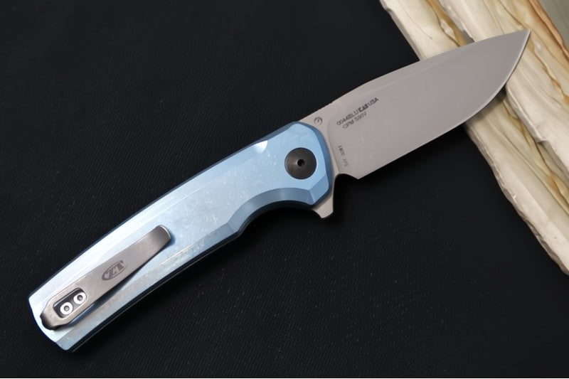 Zero Tolerance 0044BLU Button Lock Flipper Limited Edition - CPM-S90V Steel / Stonewashed Finish / Blue Anodized Full Titanium Handle