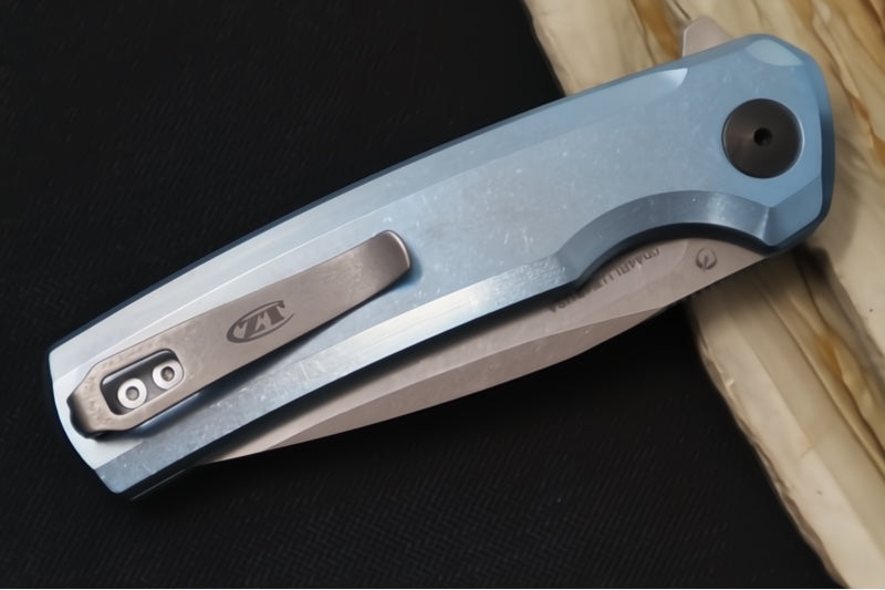 Zero Tolerance 0044BLU Button Lock Flipper Limited Edition - CPM-S90V Steel / Stonewashed Finish / Blue Anodized Full Titanium Handle