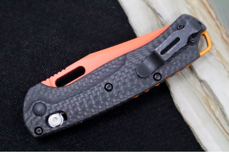 Benchmade 15533OR-01 Mini Taggedout Manual Folder - CPM-Magnacut Steel / Clip Point Blade with Orange Cerakote / Black Carbon Fiber Handle