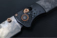 Benchmade 15085BK-2601 Limited Edition Mini Crooked River - Carbon Fiber Handle & Black Anodized Aluminum Bolsters / Black DLC Coated Deep Etch Rose Damasteel Blade / Copper PVD Coated Hardware & Accents - Northwest Knives