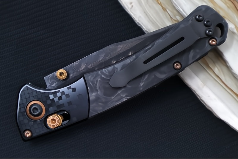 Benchmade 15085BK-2601 Limited Edition Mini Crooked River - Carbon Fiber Handle & Black Anodized Aluminum Bolsters / Black DLC Coated Deep Etch Rose Damasteel Blade / Copper PVD Coated Hardware & Accents - Northwest Knives