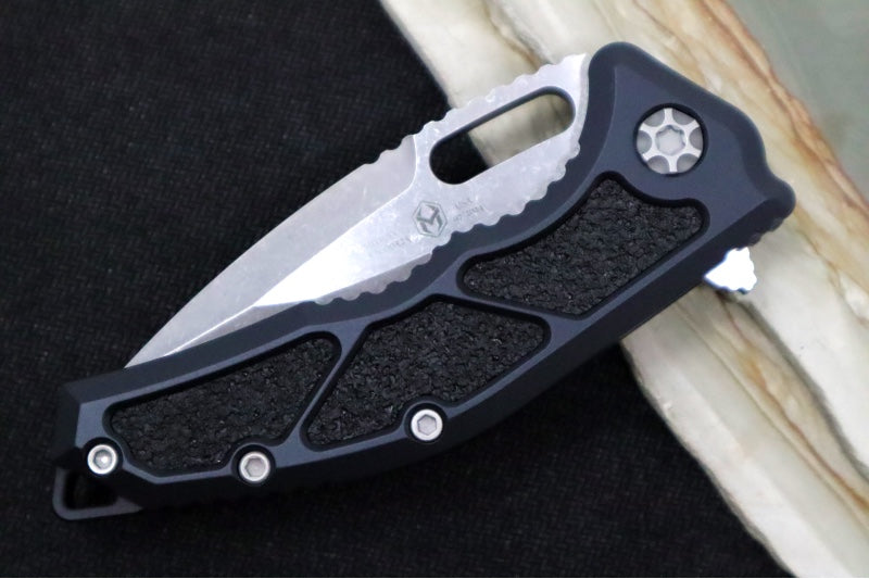 Heretic Knives Medusa Manual Flipper - Tanto Blade / CPM-Magnacut Steel / Black Anodized Aluminum Handle with Black Grip-Tape Inlays / Battleworn Finished Blade and Hardware H009-5A