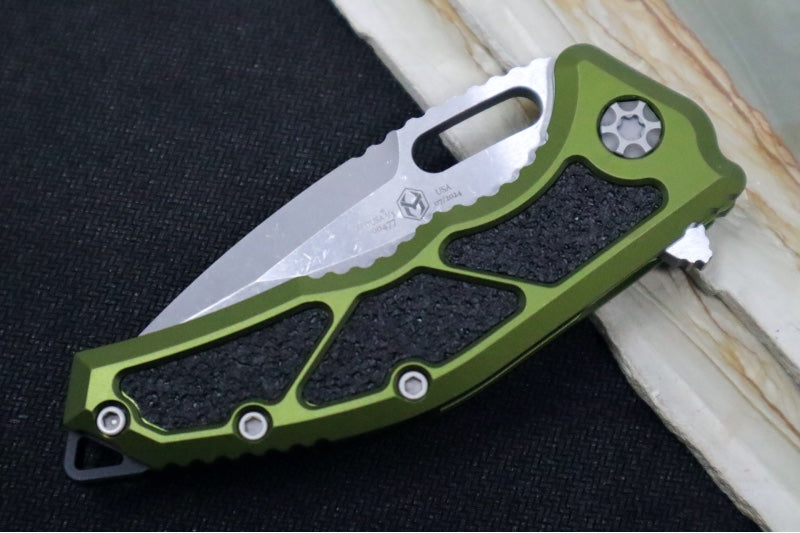 Heretic Knives Medusa Manual Flipper - Tanto Blade / CPM-Magnacut Steel / OD Green Anodized Aluminum Handle with Black Grip-Tape Inlays / Battleworn Finished Blade and Hardware H009-5A-GRN - Northwest Knives