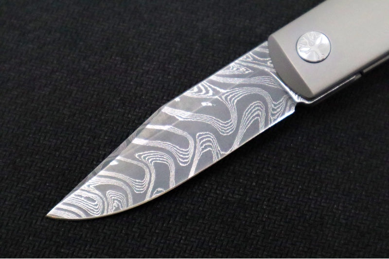 Boker Annual Damascus 2024 - Carbon Fiber & Titanium Handle / Black Boomerang 100 Layered Chad Nichols Damascus 1132024DAM