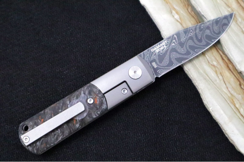 Boker Annual Damascus 2024 - Carbon Fiber & Titanium Handle / Black Boomerang 100 Layered Chad Nichols Damascus 1132024DAM