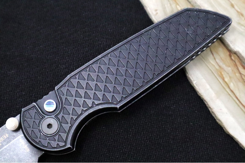 Pro Tech TR-3 Integrity Bladeshow West Exclusive - Drop Point with Double Thumb Studs / Acid Washed Finish / CPM-S35VN Steel / Relic Textured Battleworn Black Anodized Titanium Handle / Abalone Button