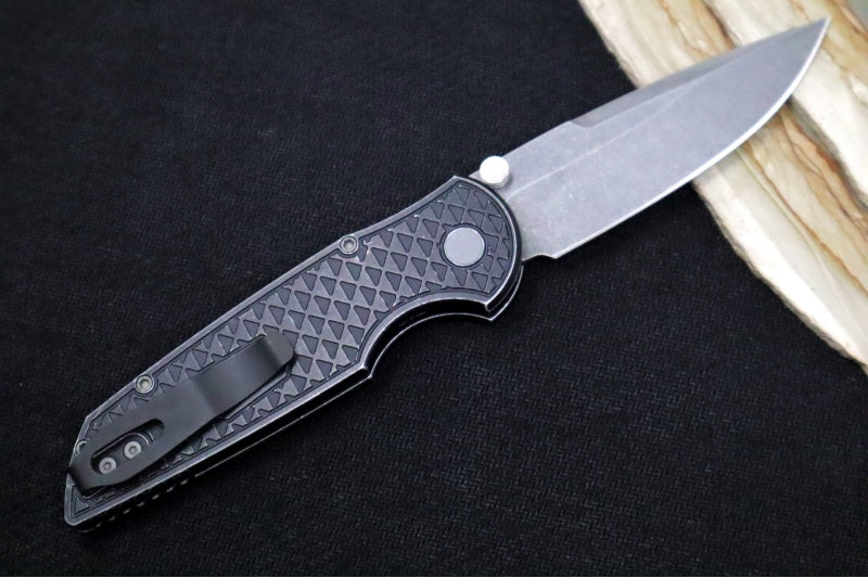 Pro Tech TR-3 Integrity Bladeshow West Exclusive - Drop Point with Double Thumb Studs / Acid Washed Finish / CPM-S35VN Steel / Relic Textured Battleworn Black Anodized Titanium Handle / Abalone Button